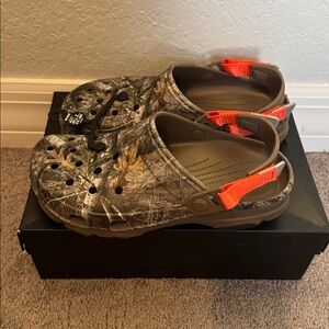 Camouflage Clogs with Orange Accents